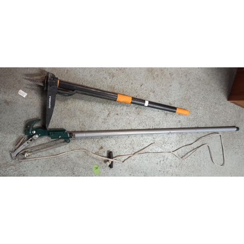 63 - A Fiskars Weed Remover & Extending Lopper.