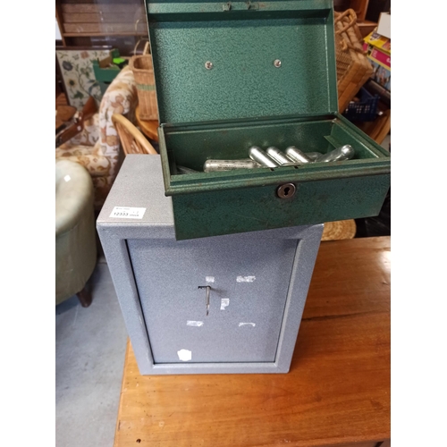 358 - An Ammunition Safe With 2 Keys, A Tin Of CO2 Cartridge.