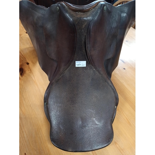 337 - A Brown Leather Horse Saddle.