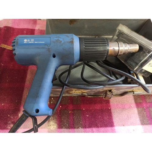 155 - A 240v Heat Gun With Assorted Shrink Tubing In Metal Case.