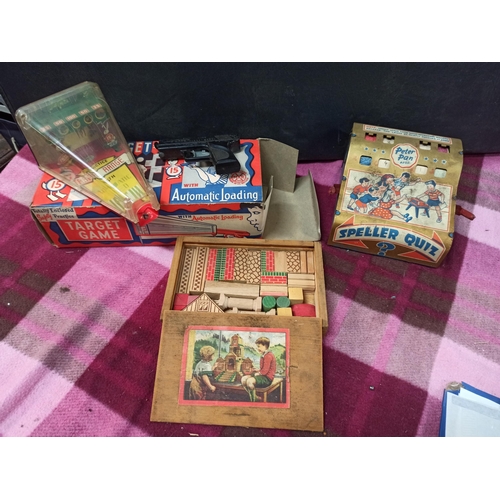 1093 - A Marx Target Game In Original Box, A Peter Pan Spell Quiz, & Building Blocks.