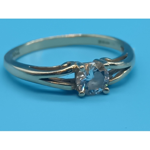 407 - A 9ct Gold White Stone Solitaire ring.