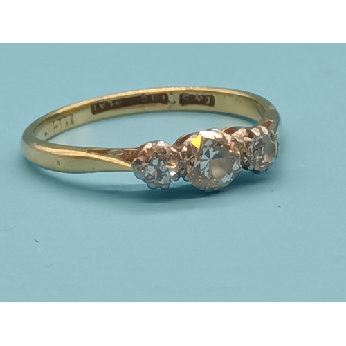 402 - A 9ct Gold & Diamond Trilogy Ring.