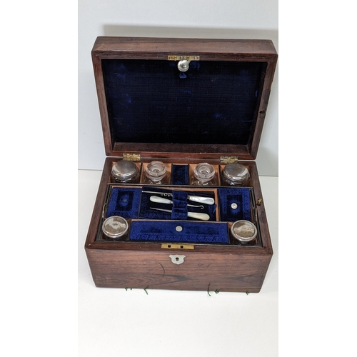 587 - A Victorian Rosewood Vanity Box.