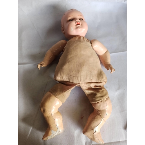 1092 - A Vintage Doll With Cloth Body. A.M Germany On Back Of Neck.