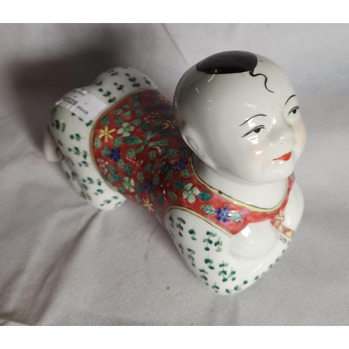 388 - A Vintage Chinese Porcelain Child Ornament.
17cm H x 23cm L x 10cm W