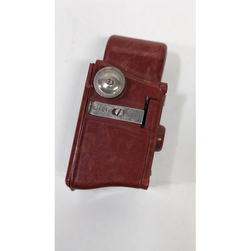 783 - Coronet Midget Camera by Coronet Camera co. Birmingham 1930's for 16mm Roll Film in Red and Black Mo... 