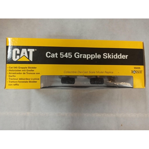 1095 - Cat 545 Grapple Skidder Die Cast Model In Original Box & Packaging. Made By Norscof