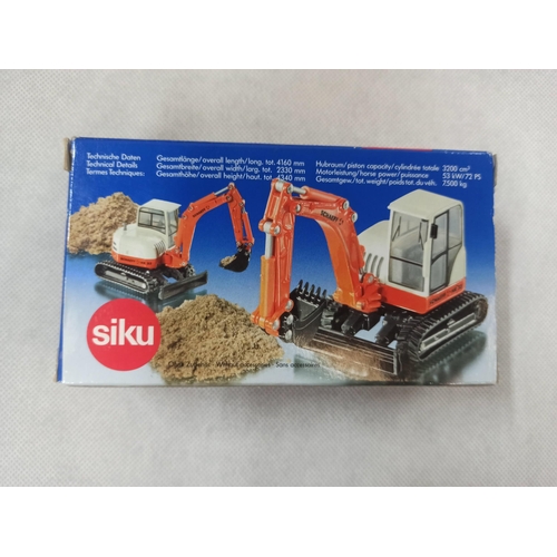 1098 - Siku 3521 Schaeff HML Excavator  Die Cast Model In Original Box & Packaging.