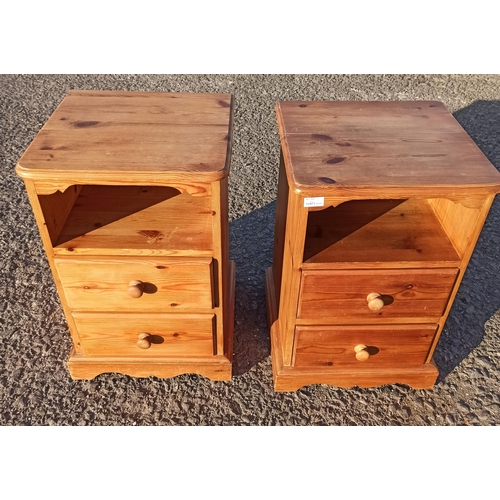 719 - A Pair Of Pine Bed Side Tables, With 2 Drawers.
64cm x 41cm x 40cm.