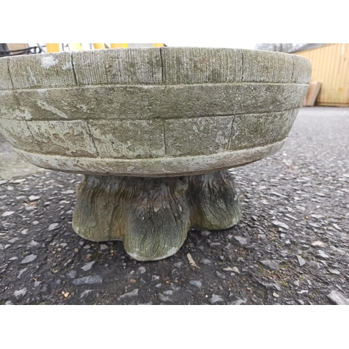 7 - A Large Concrete Bird Bath With Tree Stump Base.
33cm H x 60cm.