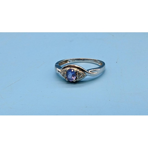 416 - A 14ct  White Gold, Diamond and Tanzanite Ring 3 Grms