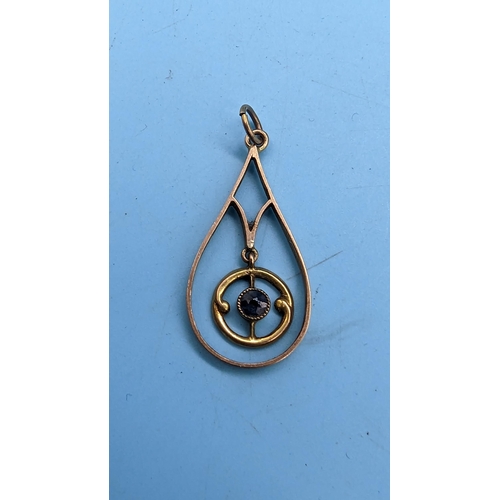 423 - A 9ct Gold and Sapphire Pendant 1.3 grams