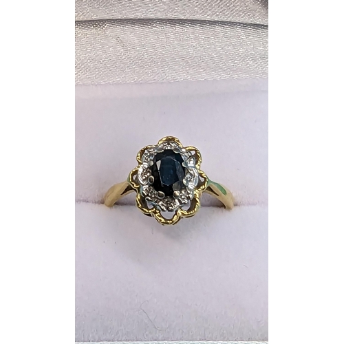 401 - A Hall Marked 18ct Sapphire and Diamond Ring