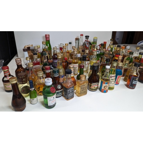 429 - A Large Quantity Of Miniature Spirit & Liqueur Bottles.(Some opened/empty)