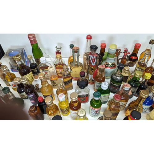 429 - A Large Quantity Of Miniature Spirit & Liqueur Bottles.(Some opened/empty)