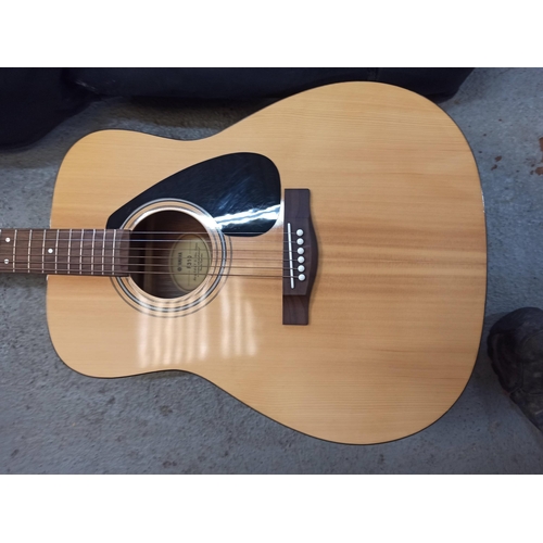 221 - A Yamaha F310 Acoustic Guitar In Padded Case.