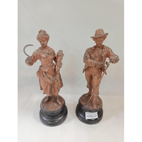 380 - A Pair of Spelter Figures Standing 27cm High