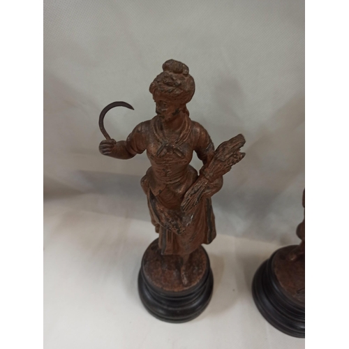 380 - A Pair of Spelter Figures Standing 27cm High