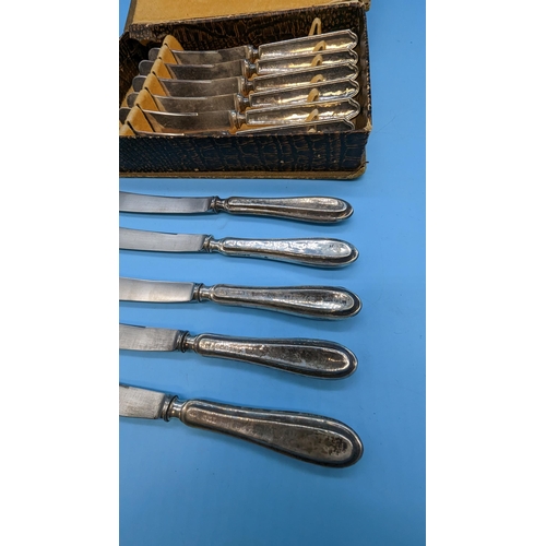 563 - A Cased Set of 6 x Silver Handled Butter Knives Plus Others