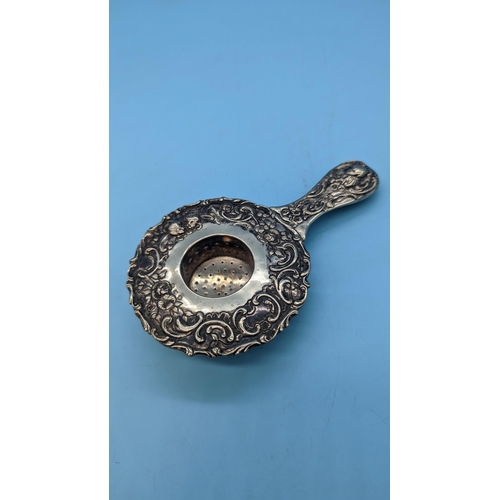 558 - An Ornate Silver Tea Strainer .800 Continental Silver Tea Strainer 88 Grams