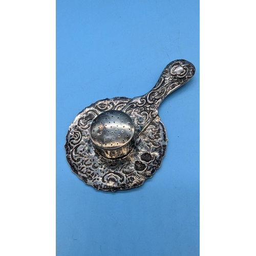 558 - An Ornate Silver Tea Strainer .800 Continental Silver Tea Strainer 88 Grams