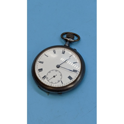 569 - An Antique Nickel Cased Pocket Watch