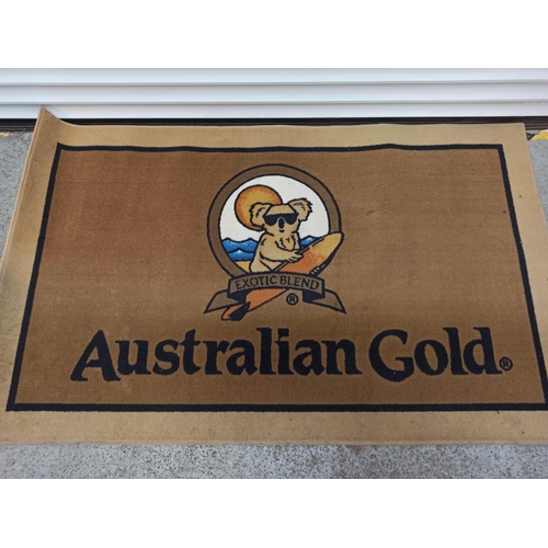 308 - An Australian Gold Tanning Lotion Mat.
150cm x 92cm.