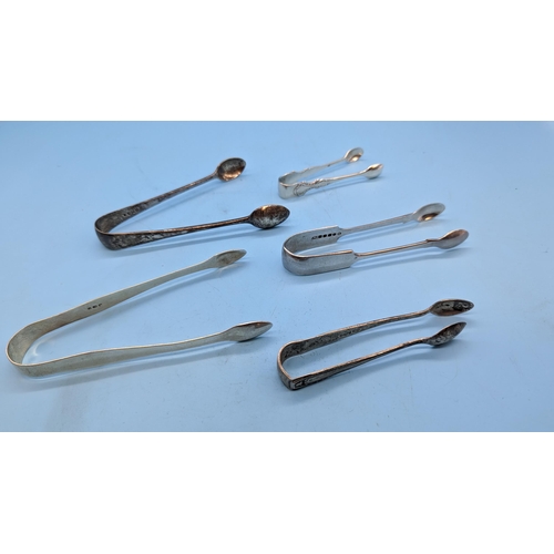 442 - A Collection of Hallmarked Silver Sugar Tongs 130 grams