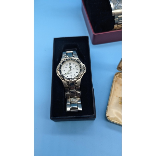 673 - 4 x Boxed Watches.