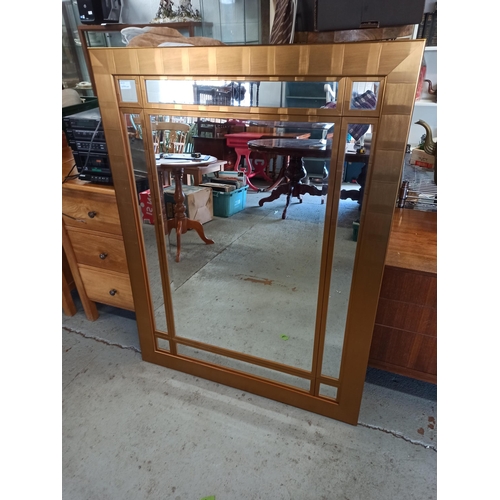 1031 - A Large Golden Framed Bevelled Mirror.
129cm x 98cm.