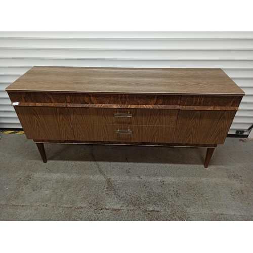 936 - A Vintage Sideboard With 3 Drawers & 2 Cupboards. Made By Stonehill Furniture.
74cm H x 152cm W x 46... 