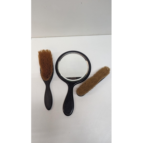 938 - An Ebonised Vanity Set With Monogram.