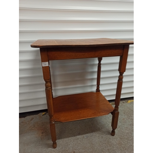 556 - A Vintage Occasional Table With Lower Shelf.
72cm H x 59cm W x 46cm D.