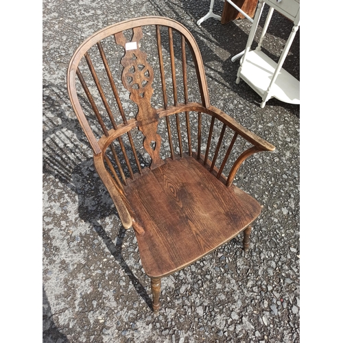 572 - A Antique High Backed Windsor Chair. In Need Of repair To Frame As Pictured.