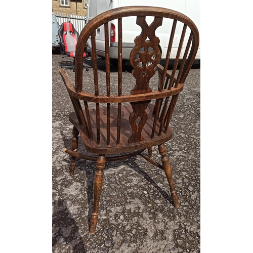 572 - A Antique High Backed Windsor Chair. In Need Of repair To Frame As Pictured.