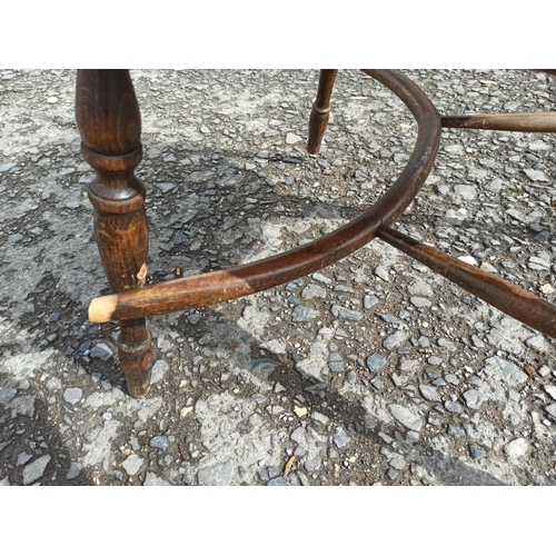 572 - A Antique High Backed Windsor Chair. In Need Of repair To Frame As Pictured.