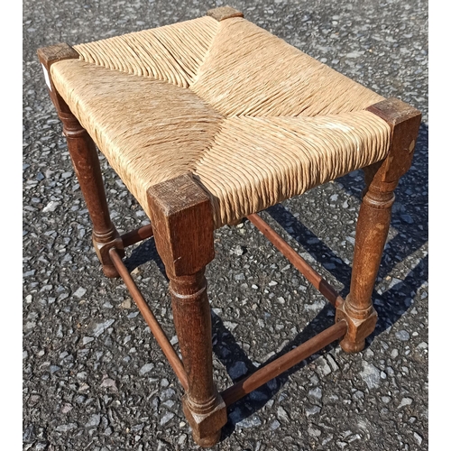 574 - Antique Rattan Topped Stool.
47cm H x 43cm W x 33cm D.