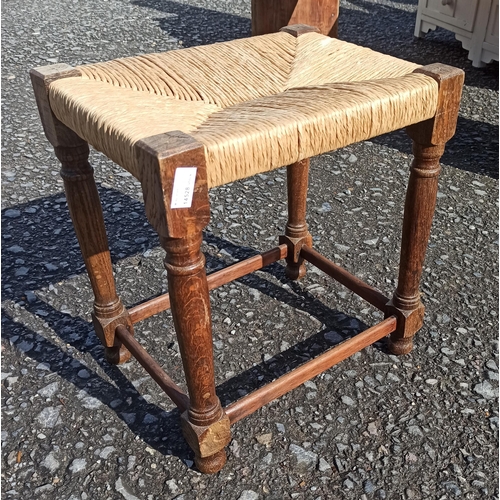 574 - Antique Rattan Topped Stool.
47cm H x 43cm W x 33cm D.