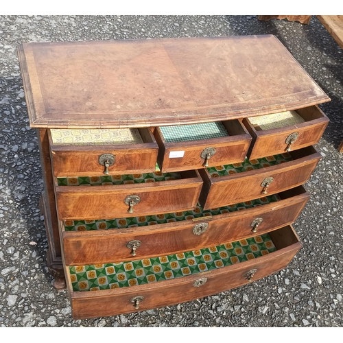 559 - A 7 Draw Antique Inlaid Chest Of Drawers With Brass Handles.
78cm H x 85cm W x 40cm D.