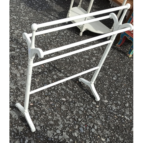 575 - A White Painted Antique Towel Rail.
89cm H x 76cm W x 31cm D.