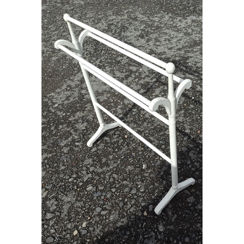 575 - A White Painted Antique Towel Rail.
89cm H x 76cm W x 31cm D.