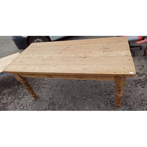 560 - A Antique Pine Kitchen Table, Top Slightly Warped.
77cm H x 186cm L x 90cm W.