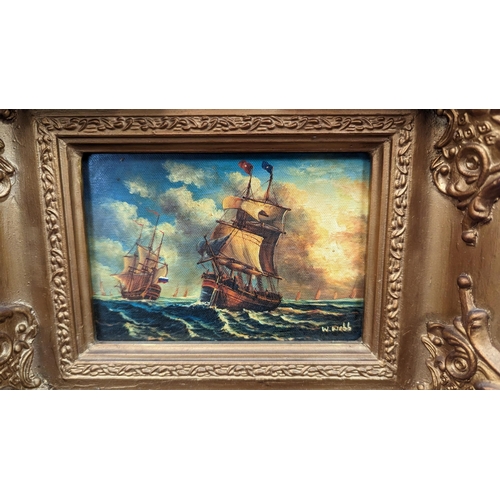 447 - A Picture Of Sailins Ships In A Heavy Gilt Frame.
32cm x 28cm.