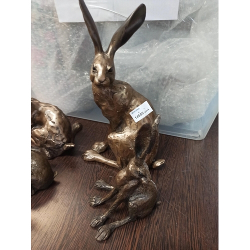 1019 - 4 x Resin Hares By Firth Sculptures. (small sitting hare has broken ear).