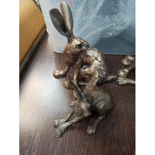 1019 - 4 x Resin Hares By Firth Sculptures. (small sitting hare has broken ear).