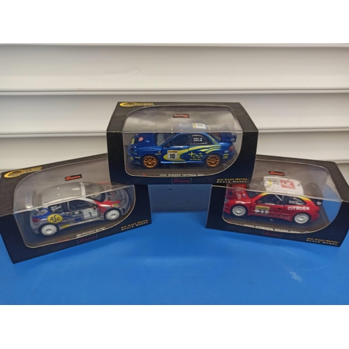 1224 - 3 x Boxed Saico Craftsman series WRC Cars, Including Peugeot 206, Citroen Xsara And Subaru Impreza.