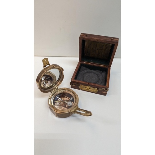 664 - A Heavy Brass Compass in Wooden Box