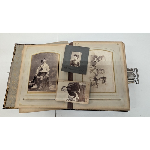 662 - A Late 19th/Early 20th Century Photo Album.