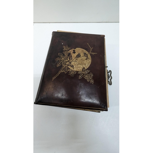 662 - A Late 19th/Early 20th Century Photo Album.